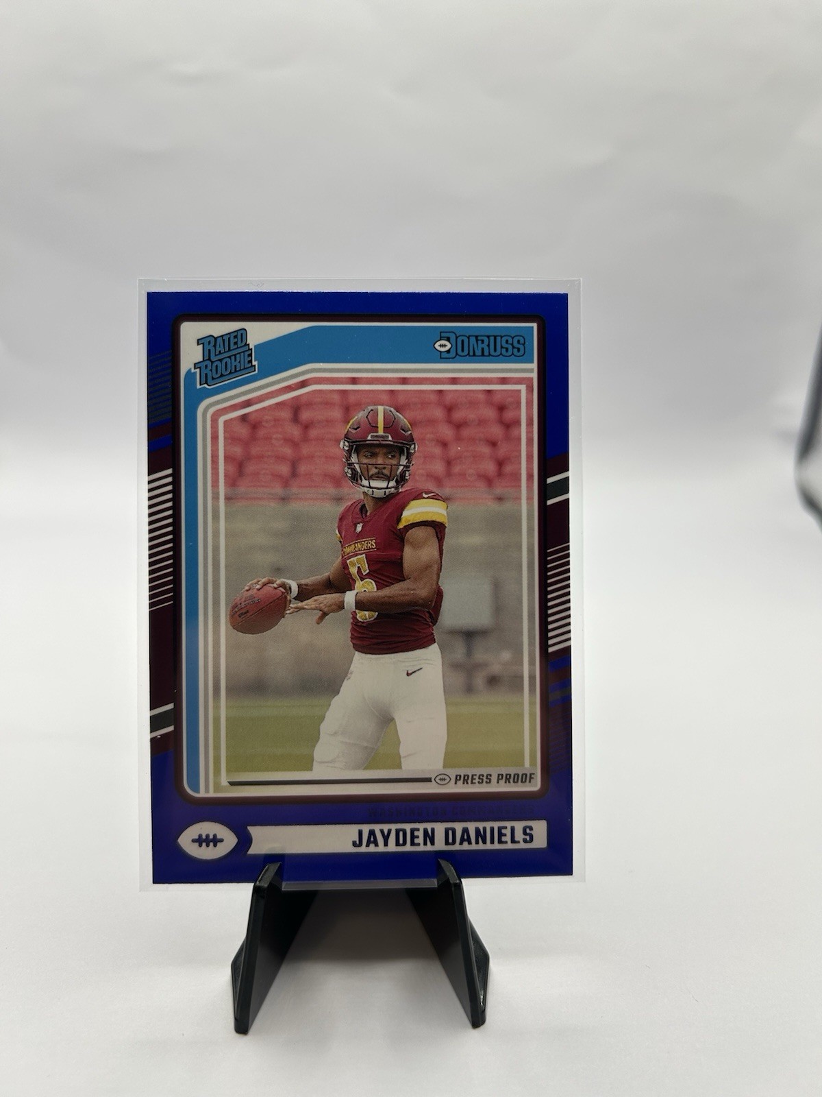 2024 Panini Donruss - Rated Rookie Jayden Daniels #389 Blue Press Proof (RC)