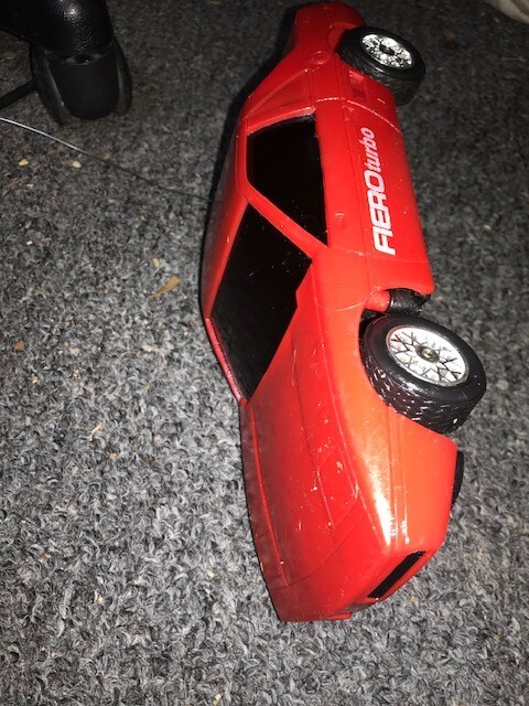 VINTAGE HONG KONG RED PONTIAC FIERO TURBO RADIO CONTROL CAR 11" USED