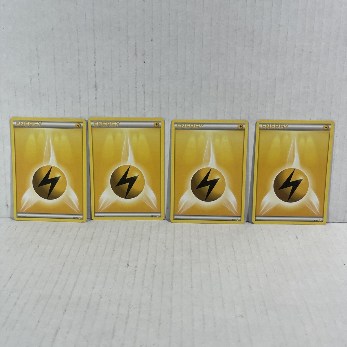 POKEMON YELLOW LIGHTING ENERGY CARDS (4) from different sets