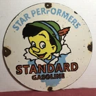 VINTAGE STANDARD GASOLINE 12” PORCELAIN STAR PERFORM PINOCCHIO WALT DISNEY SIGN