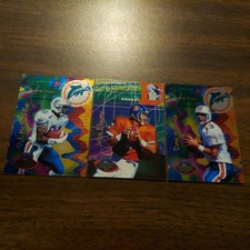 Dan Marino 82 John Elway 74 OJ McDuffie 52 1993 Playoff ILLUSIONS Rookie RC Card