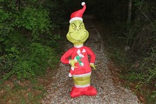 Gemmy Christmas Airblown Inflatable Grinch w/Red and White Candy Cane, 4 ft Tall