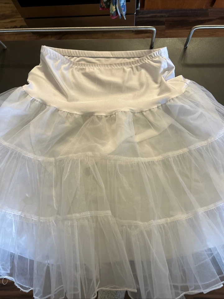 Medio deslizamiento con volantes en capas Foto 3 de 4