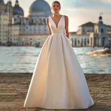 Deep V Neck Wedding Dresses Sleeveless Backless Pearls Pleated Satin Bridal Gown