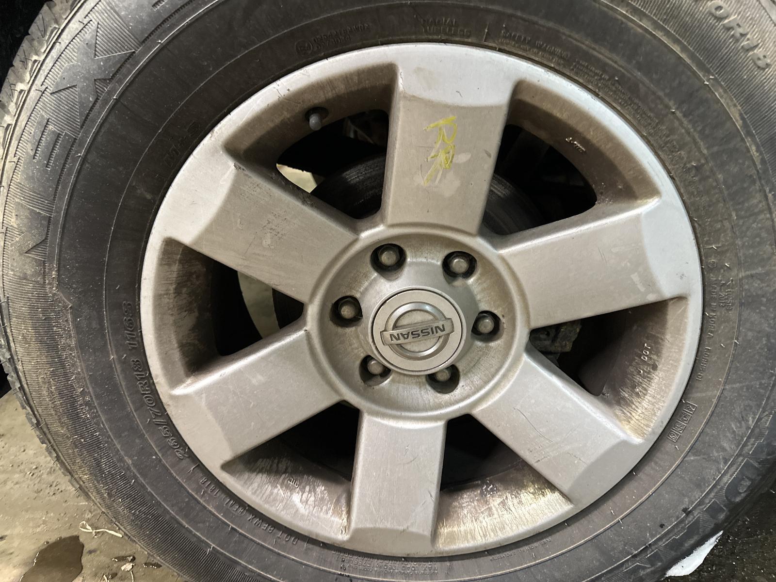 Used Wheel fits: 2004 Nissan Titan 18x8 alloy 6 spoke silver painted Grade B