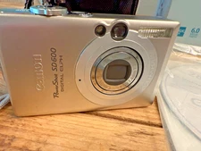 Canon PowerShot ELPH SD600 6.0MP Digital Camera w/ Battery, Charger, & SD Card