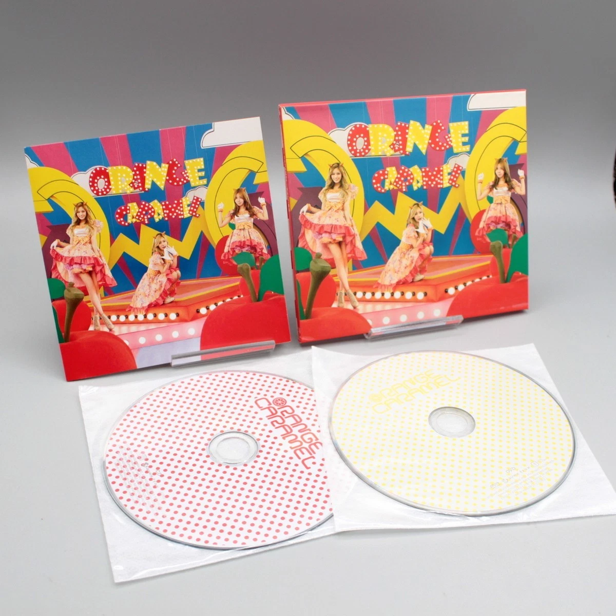 Rock CDs Orange Caramel for sale | eBay