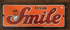 Vintage 1950’s Drink Smile Soda Porcelain Advertising Sign 10” x 4”