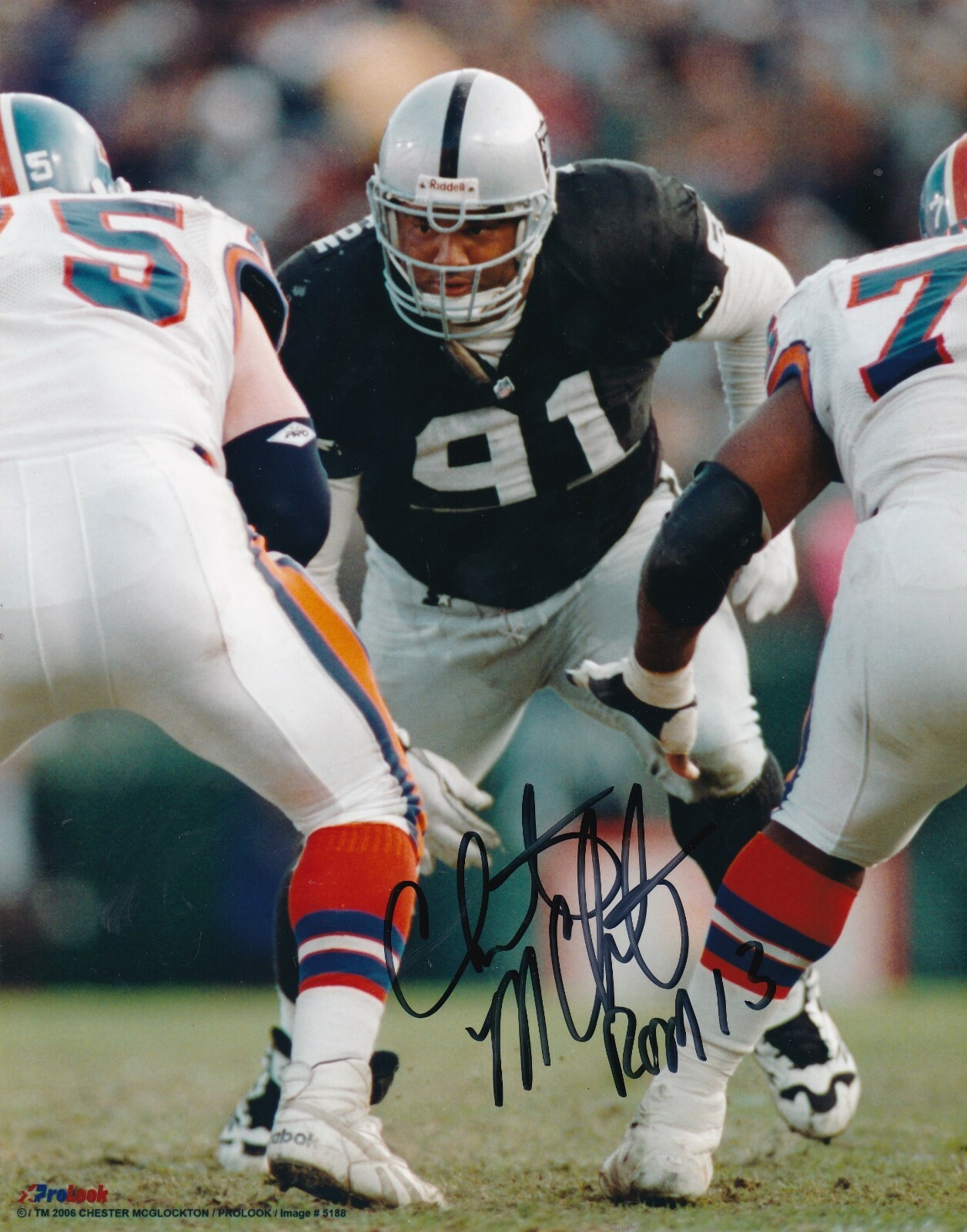 CHESTER MCGLOCKTON OAKLAND RAIDERS ACTION SIGNED 8x10 