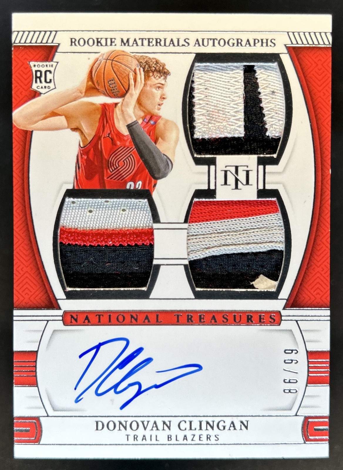 2024-25 National Treasures Donovan Clingan Rookie Auto Triple Patch #/99 view 1