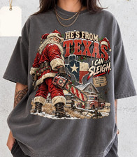 He's From Texas Christmas T-Shirt, Funny Santa Chainsaw Tee