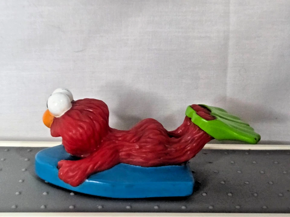 Balsa de piscina azul Elmo calle Sésamo Jim Henson bañera juguete vintage PVC 4"" Foto 3 de 4