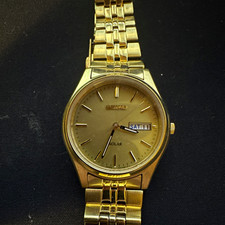 Imagen de Seiko Solar Quartz Day/Date Men's Gold Tone Analog Dress Watch Metal Bracelet