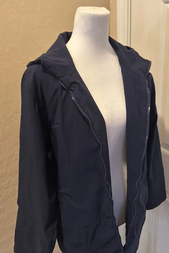 Chaqueta Norton Studio Ligera Elastizada con Capucha Cremallera 20” P2P 29” Longitud Pequeña Foto 3 de 4