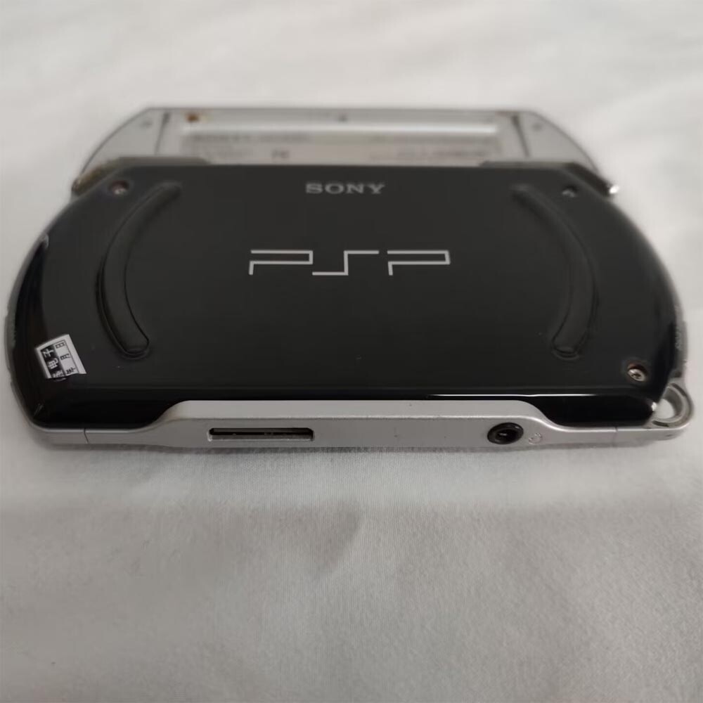 Sony PSP GO console Black with Charger PSPN1001 Music button