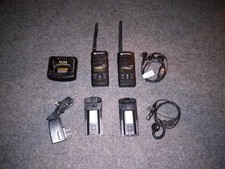 2 Motorola RDM2070D Walmart VHF Two-Way Radio with earpiece headset