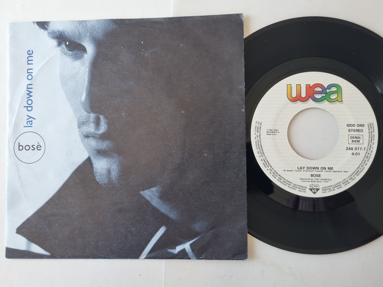 Miguel Bosé - Lay Down On Me/ Como Un Lobo 7'' Vinyl Germany