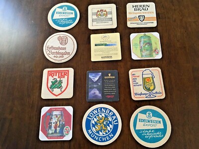 Twelve assorted Beer Mats