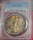 1986 $1 Uncirculated Silver American Eagle Rainbow Toned PCGS Certified MS-66