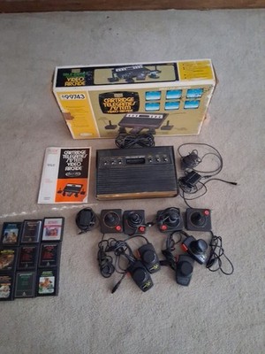 Atari 2600 Sears Tele-Games  Complete  W/ 9 games. lots of extras. untested.