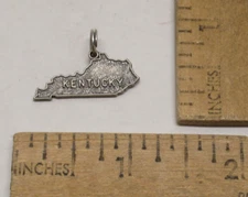 KENTUCKY - CHARM - STERLING - THE BLUE GRASS STATE - H within Bell mark