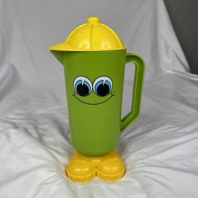 Vintage 1970s Deka Footsie Tootsie Smiley Face Green Yellow Plastic Pitcher