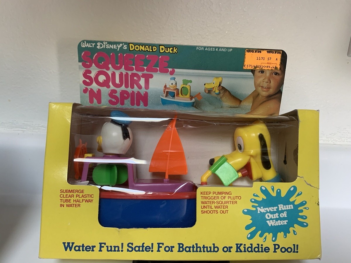walt disney donald duck squeeze squirt n spin floating target game