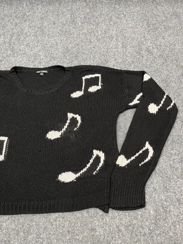 white knit women music notes 