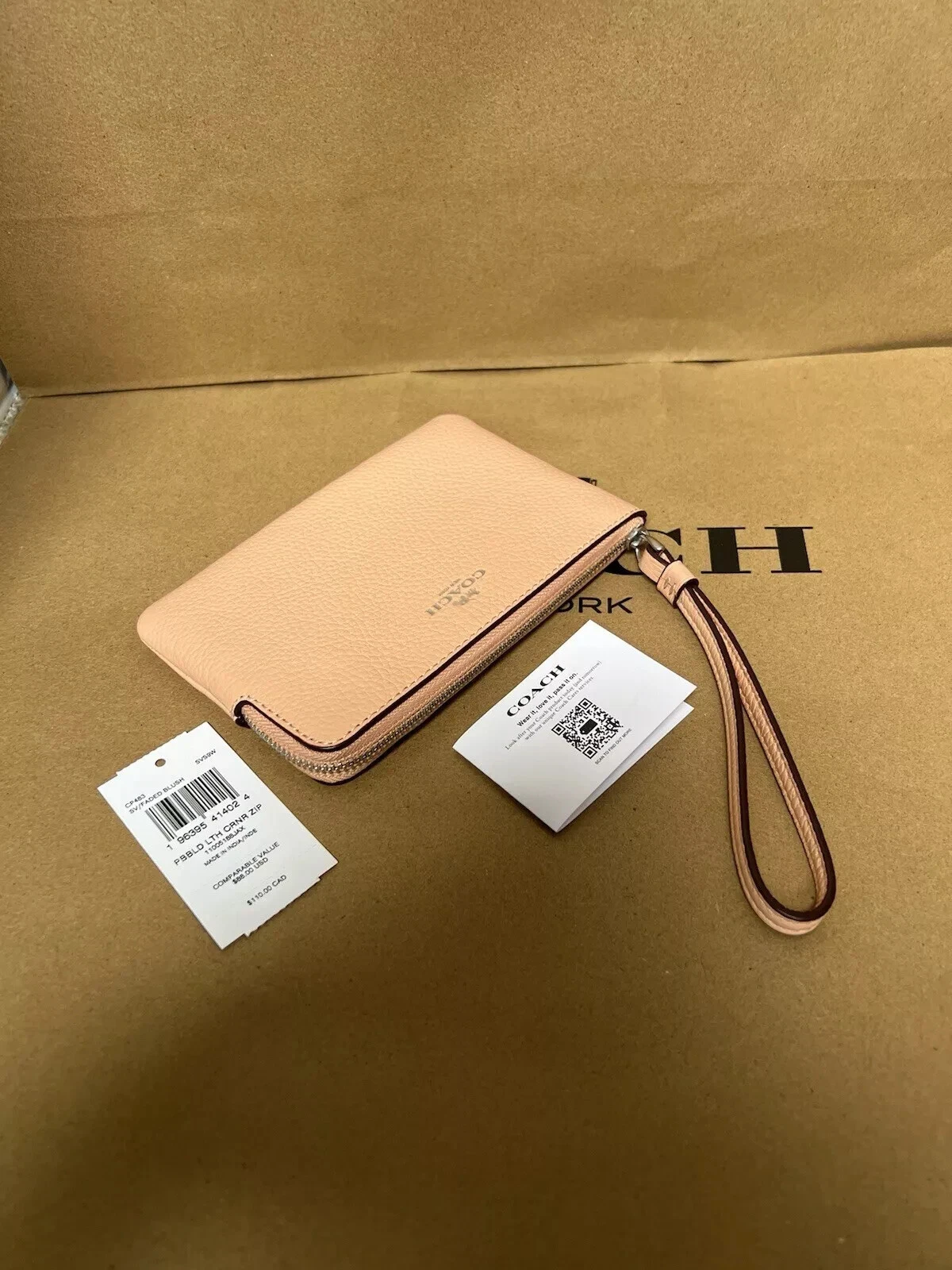 ? Bracciale Coach con zip angolare pelle di ciottoli sbiadita blush (pesca) nuovo con etichette CP483 ?