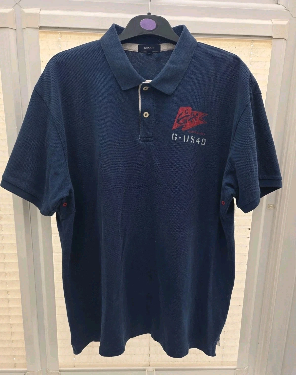 MEN'S GANT 4XL NAVY BLUE POLO SHIRT WITH GANT CHEST LOGO. GOOD CLEAN CONDITION.
