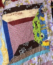 vibrant patchwork creation is a handmade "scrappy" quilt 64x80 Vintage