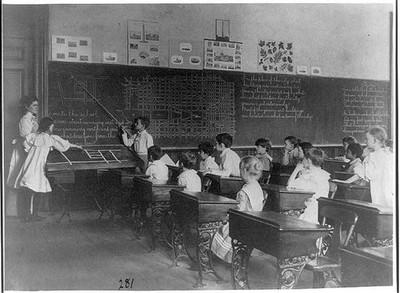 Elementary school children studying map of city,Washington,D.C.,Education,1899?