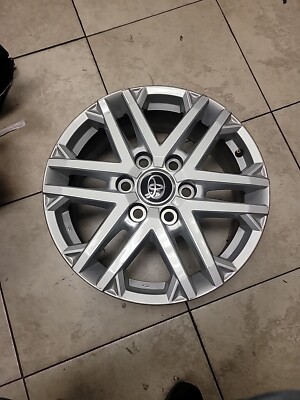 18  toyota tundra  Rim Barely,  18X7 1/2J 60 OEM Toyota Bzd L 6 long nuts 