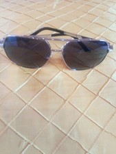 Occhiali, modello "Pilota", della Maserati. Colore dorato. 