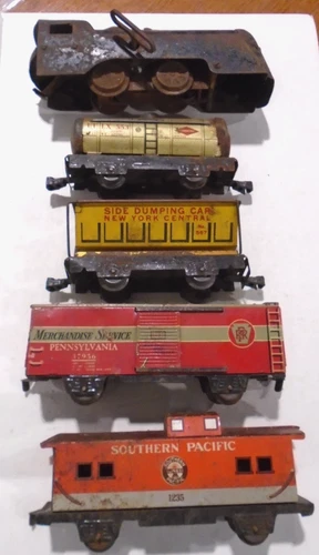 Marx Wind Up engine and four tin litho freights