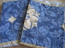 pair of blue and tan pillow shams standard size