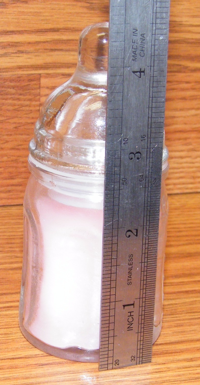 Unbranded / Generic Small 4 1/2" (inch) Glass Pink Baby Bottle Candle **READ** 