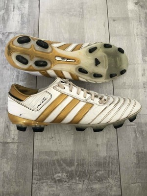 white adipure football boots