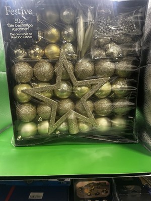 The set includes a variety of ornament shapes and sizes, including a large star