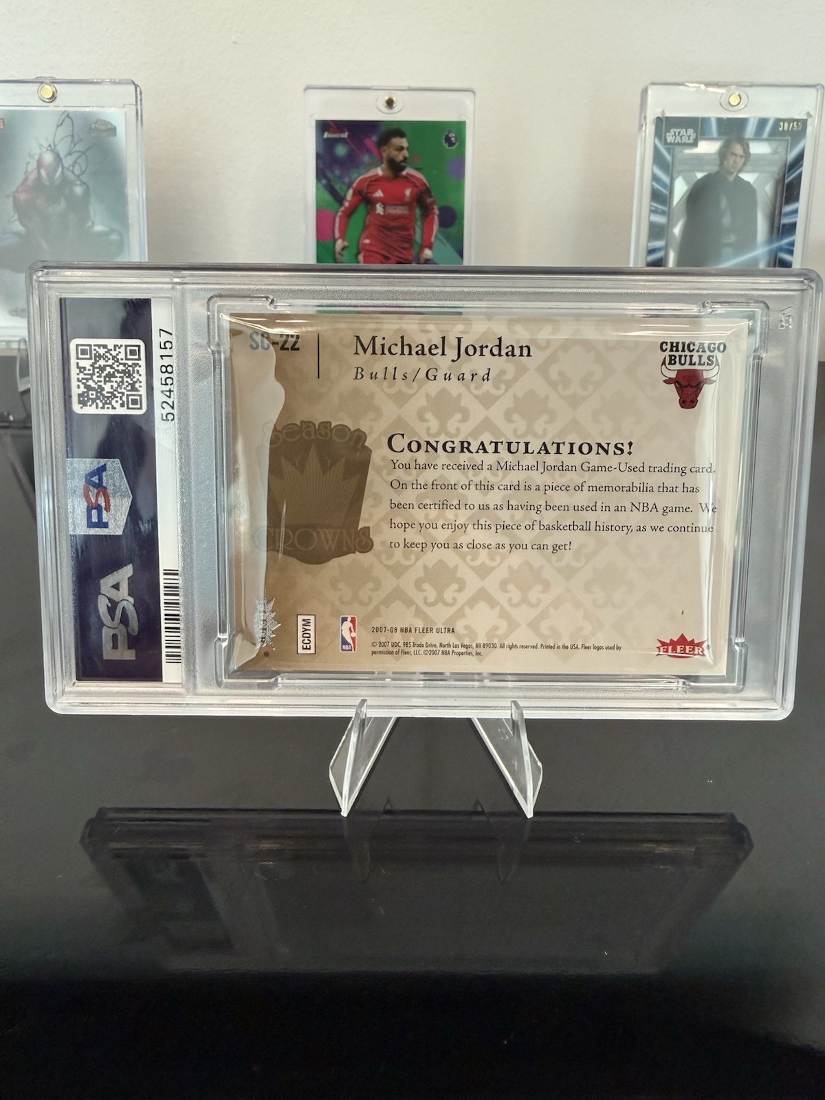 2007 Fleer Ultra Michael Jordan SC-22 Season Crowns Jersey Game Worn Patch PSA 9 view 2