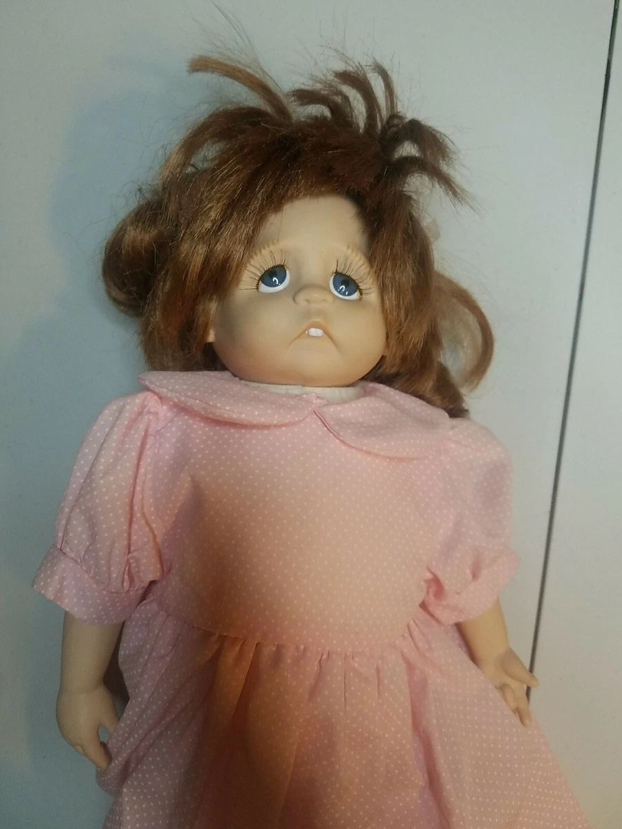 Creepy baby cheap teeth doll