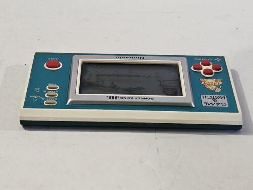 Juego y reloj Nintendo Donkey Kong Jr. vintage 1982 portátil funcionando - Imagen 15 de 17
