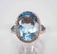 5.50Ct Oval Cut Natural Blue Topaz Halo Engagement Ring 14K Yellow Gold Plated