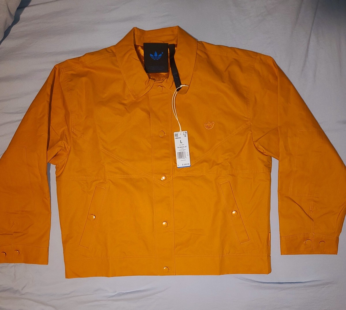 ADIDAS BLUE VERSION TIE-BREAK CANVAS JACKET - FOCUS ORANGE ADIDAS BLUE VERSION TIE-BREAK CANVAS JACKET - FOCUS ORANGE