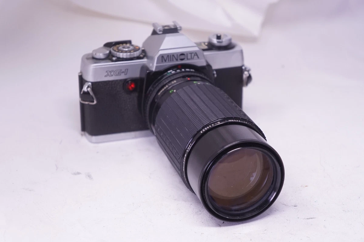 Appareil photo ancien réflex : MINOLTA XG-1 + TOKINA 35-105mm 1:3,5