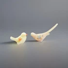2 HAND PAINTED FENTON BIRD OF HAPPINESS CUSTARD URANIUM & BEIGE SATIN GLASS