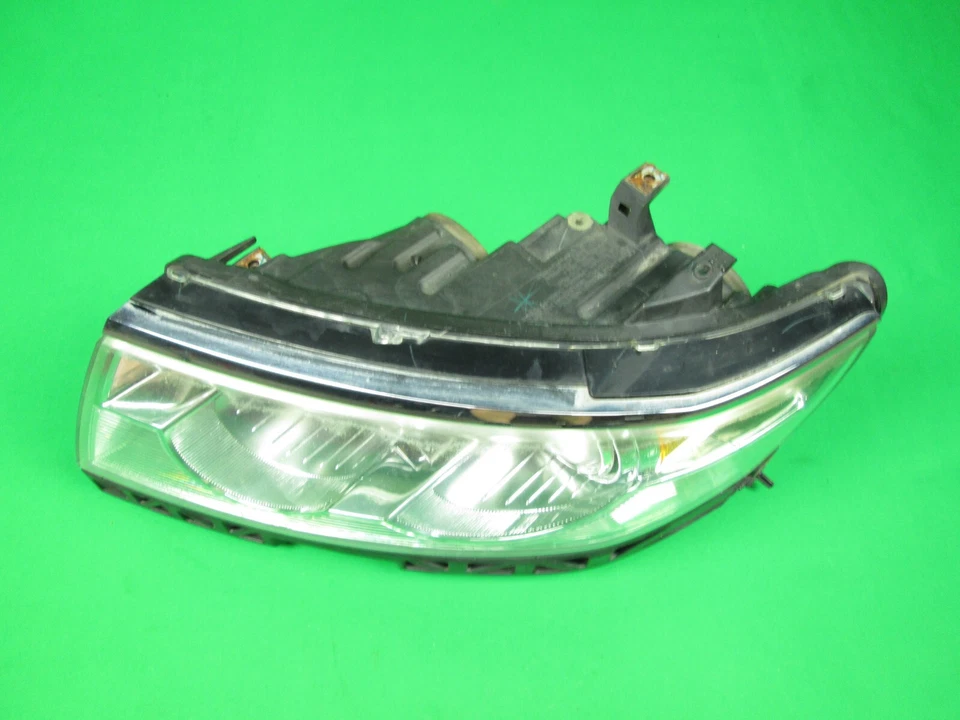 Conjunto de faros halógenos del lado del conductor izquierdo Lincoln Zephyr/MKZ 2006-2009 OEM Foto 2 de 3