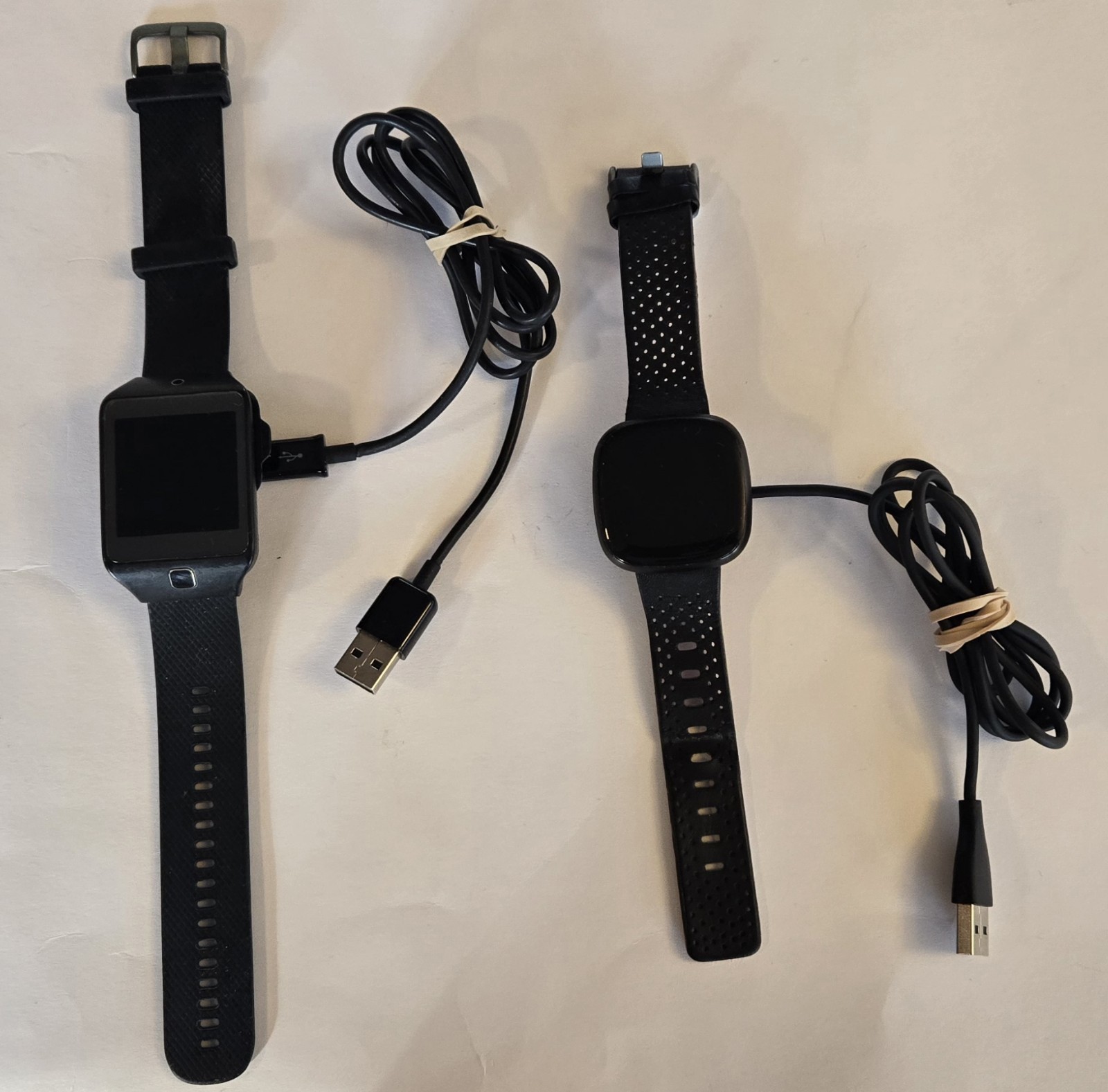 2 Pre-Owned Samsung Gear 2 & Fitbit Versa 3 Smartwatches in Black
