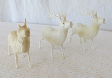 Vintage set of 3 Celluloid Christmas Reindeer 2 w/Red eyes