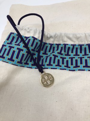 tory burch bolsa charms